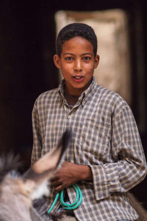 Erfoud, Morocco - Oct 17, 2019: People on alley, streetlife in Ksar Maadid, Erfoud, Rissani, Morocco...