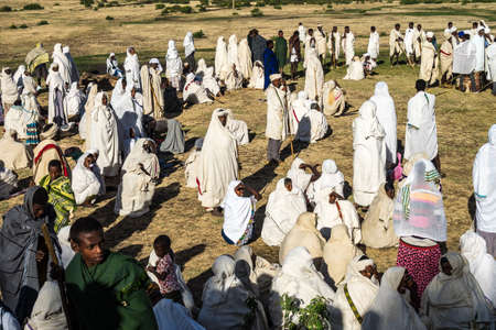 Gondar, Ethiopia - Feb 06, 2020: Ethiopian people at a mass at the surrounding area of Gondar in Ethiopia, Africaのeditorial素材