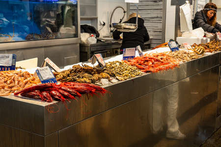 Cadiz, Spain - Nov 16, 2019: Shopping in Cadiz downtown Market, Mercado Central de Abastos. Cadiz, Andalusia, Spain.のeditorial素材