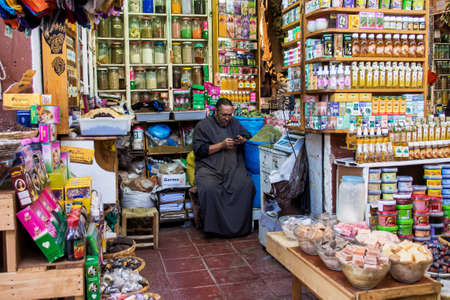 Marrakesh, Morocco - Oct 22, 2019: People at the Marrakesh souk, the largest traditional market in Morocco, with 18 souks selling wares ranging from traditional Berber carpets to modern electronicのeditorial素材