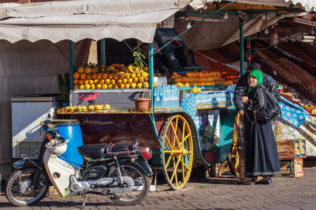 Marrakesh, Morocco - Oct 22, 2019: People at Jemaa el Fna market square in Marrakesh, Morocco, north Africa. Jemaa el-Fnaa, is a famous square and market place in Marrakesh's medinaのeditorial素材