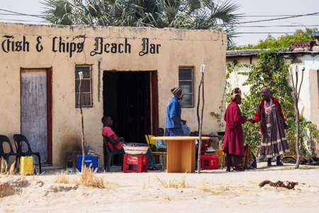 Opuwo, Namibia - Jul 06, 2019: Namibian people seen in Opuwo in the Kunene Region of Namibia in north-western Namibia, Africaのeditorial素材