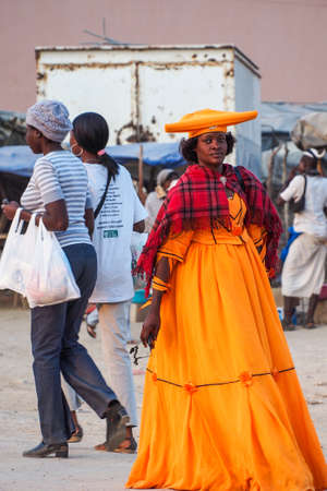 Opuwo, Namibia - Jul 06, 2019: Herero Woman in traditional clothes in Opuwo. Namibia. The Herero belonging to the Bantu group, with about 240,000 members alive today.のeditorial素材