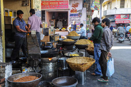 Udaipur, India - Jan 03, 2020: Traditional indian street market in Udaipur Rajasthan, India