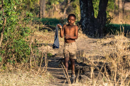 Tis Issat, Ethiopia - Feb 05, 2020: People living near the Blue Nile falls, Tis-Isat Falls, meaning great smoke in Amharic in Amara region of Ethiopia, Eastern Africaのeditorial素材