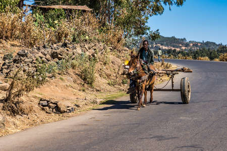 Gondar, Ethiopia - Feb 07, 2020: Ethiopian people on the road from Gondar to the Simien mountains,...