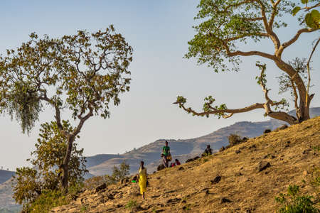 Tis Issat, Ethiopia - Feb 05, 2020: People living near the Blue Nile falls, Tis-Isat Falls, meaning great smoke in Amharic in Amara region of Ethiopia, Eastern Africaのeditorial素材