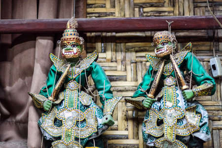 Traditional handicraft puppets are sold in a market at Mandalay, Myanmar former Burmaの写真素材