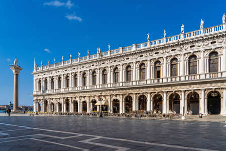 View to Marciana Library of Saint Mark renaissance style facade from Saint Mark's square in Venice, Italyの写真素材
