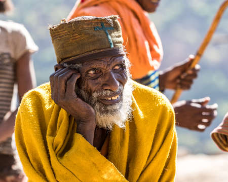 Aksum, Ethiopia - Feb 08, 2020: Old ethiopian man on the road from Axum to the Simien mountains, North Ethiopia, Africa.のeditorial素材