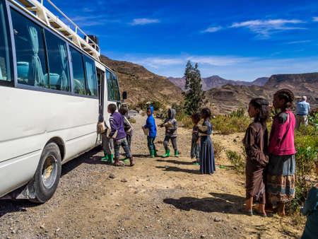 Lalibela, Ethiopia - Feb 12, 2020: Ethiopian children seen on the road from Lalibela to Gheralta, Tigray in Northern Ethiopia, Africaのeditorial素材
