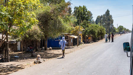 Lalibela, Ethiopia - Feb 12, 2020: Ethiopian people seen on the road from Lalibela to Gheralta,...