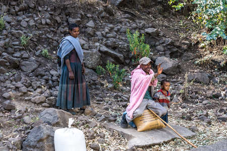 Lalibela, Ethiopia - Feb 12, 2020: Ethiopian people seen on the road from Lalibela to Gheralta, Tigray in Northern Ethiopia, Africaのeditorial素材