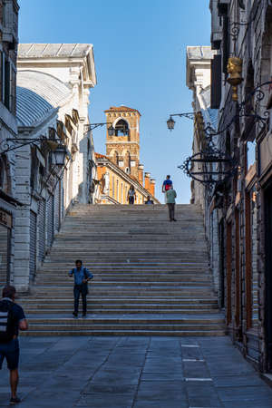 Venice, Italy - Jun 30, 2020: Rialto bridge and Grand Canal in Venice, Italy. Architecture and landmarks of Venice. Venice postcard with gondolasのeditorial素材