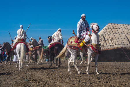 Rabat, Morocco - Oct 13, 2019: Local equestrians participate in a traditional fantasia event or...