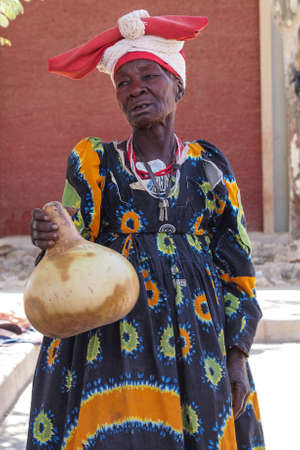 Opuwo, Namibia - Jul 06, 2019: Herero Woman in traditional clothes in Opuwo. Namibia. The Herero belonging to the Bantu group, with about 240,000 members alive today.のeditorial素材