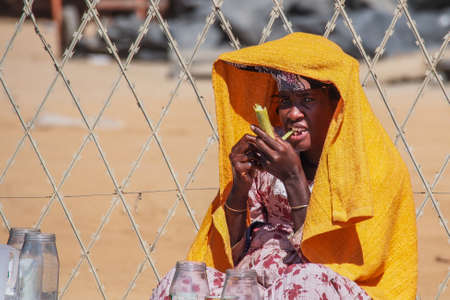Opuwo, Namibia - Jul 07, 2019: Namibian woman on the street, seen in Opuwo, the capital of the Kunene Region in north-western Namibia, Africaのeditorial素材