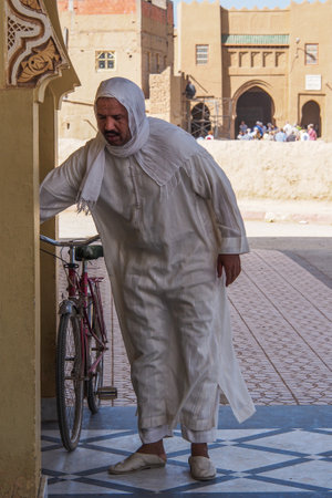 Rissani, Morocco - Oct 18, 2019: local residents of the city Rissani in their activities on the streets of the city. Africa.のeditorial素材