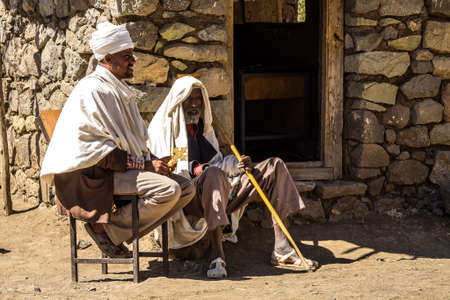 Lalibela, Ethiopia - Feb 14, 2020: Ethiopian people at the famous Monastery Neakuto Leab near Lalibela, Ethiopia, Africaのeditorial素材