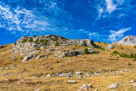 Landscape view of Col de la Cayolle pass and surrounding mountains in Alpes-Maritimes in France