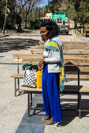 Aksum, Ethiopia - Feb 09, 2020: Ethiopian woman at Church of Our Lady St. Mary of Zion, the most sacred place for all Orthodox Ethiopians in Axum, Ethiopia.のeditorial素材