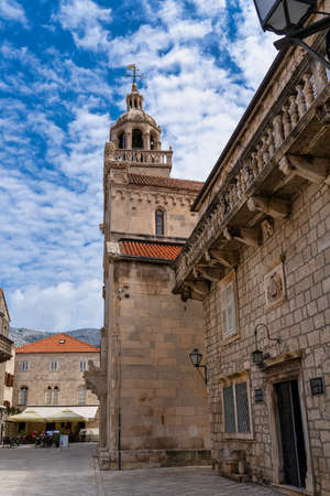 Narrow street in Korcula old town, Croatia. Korcula is a historic fortified town on the protected east coast of the island of Korculaの写真素材