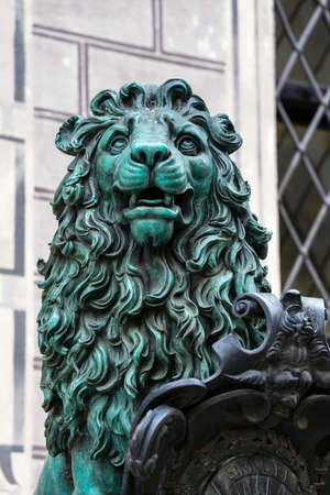 Munich, Germany - Oct 17, 2020: Bavarian lion statue at Munich Alte Residenz palace in Odeonplatz. Munich, Bavaria, Germany. Munich is the capital and largest city of the German state of Bavaria.のeditorial素材