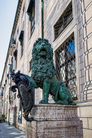 Munich, Germany - Jul 27, 2020: Bavarian lion statue at Munich Alte Residenz palace in Odeonplatz. Munich, Bavaria, Germany. Munich is the capital and largest city of the German state of Bavaria.のeditorial素材