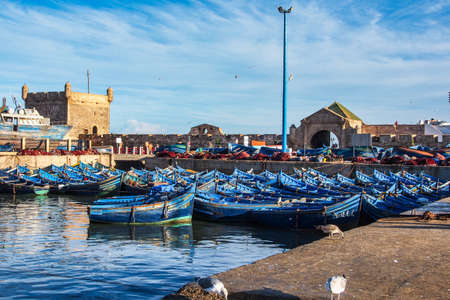 Essaouira, Morocco - Oct 24, 2019: Lots of blue fishing boats in the port of Essaouira, Morocco in Africaのeditorial素材