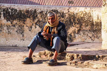 Fatehpur Sikri, India - Jan 08, 2020: Man with headscarf at Fatehpur Sikri, India.のeditorial素材