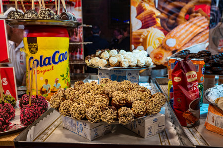 Toledo, Spain - Nov 30, 2019: illuminated Christmas market in Cathedral street, Toledo, Spain. Christmas night illuminationのeditorial素材