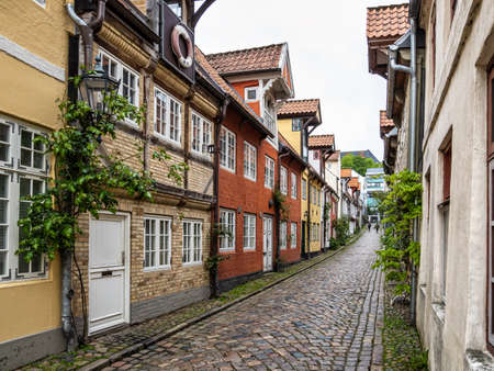 Flensburg, Germany - May 27, 2021: Colorful half timbered living houses in a row along the Oluf Samson street in old town of Flensburg, Germany in Europeのeditorial素材