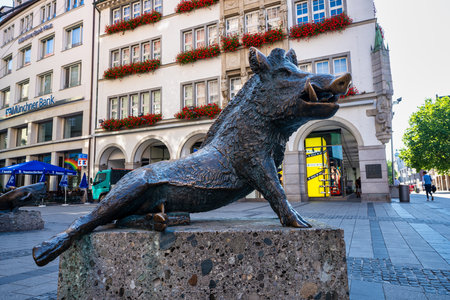 Munich, Germany - Jul 28, 2021: Statue of a boar at the door of the museum of hunting and fishing at munich, bavaria, germanyのeditorial素材