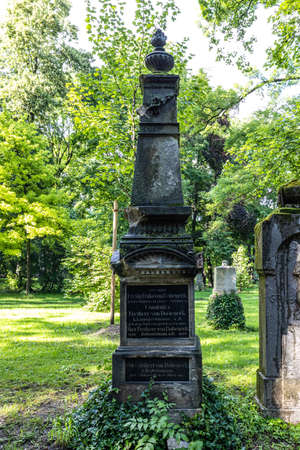 Munich, Germany - Jul 09, 2021: View of famous Old North Cemetery of Munich, Germany with historic...