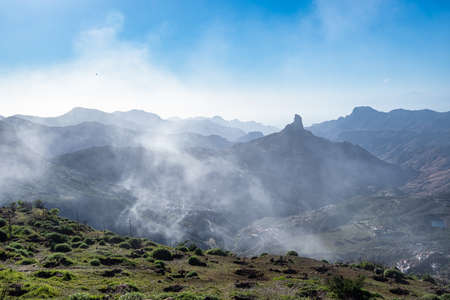 Foggy view of Roque Bentayga from Mirador de Degollada Becerra Gran Canaria, Canary Island, Spain, Europeの写真素材
