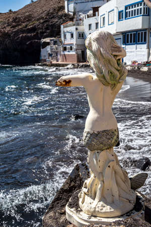 Mermaid on the beach Playa de Tufia of the small village Tufia on Gran Canaria, Spain in Europeの写真素材