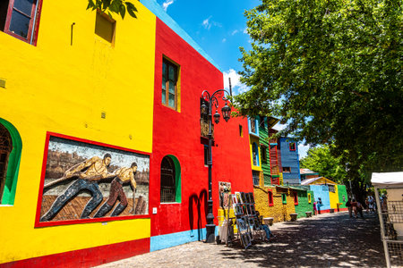 Colorful buildings on Caminito street in La Boca neighborhood at Buenos Aires, Argentina. It was a port area where Tango was born, now tourist destination with colorful houses and pedestrian streetの写真素材
