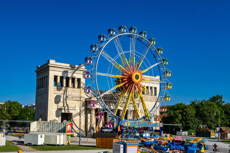 Munich, Germany - Jul 28, 2022: Ferris wheel at Konigsplatz - Kings Square, Munich - Bavaria - Munich, Germanyのeditorial素材
