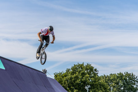 Munich, Germany - Aug 11, 2022: Riders compete at the BMX Freestyle European Championsships at Olympiapark in Munich, Germany. Men's qualifiacationのeditorial素材