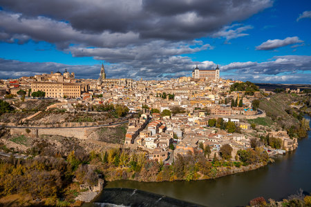 Toledo, Spain - Nov 30, 2022: Old city with its Alcazar, Royal Palace over the Tagus River sinuosity. Spain, Europeのeditorial素材