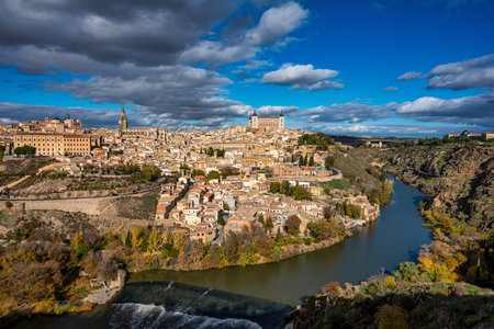 Toledo, Spain - Nov 30, 2022: Old city with its Alcazar, Royal Palace over the Tagus River sinuosity. Spain, Europeのeditorial素材
