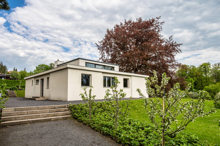 Weimar, Germany - May 12, 2023: Haus am Horn building in Weimar, Germany with grass lawn. Haus am Horn is the only truly Bauhaus building in Weimar.のeditorial素材