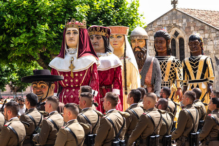 Burgos, Spain - Jun 17, 2023: Gigantes and cabezudos at Fiesta del Curpillos in Burgos, Castile and Leon, Spain. Giants and Big Heads parade is typical in festive days in Spainのeditorial素材