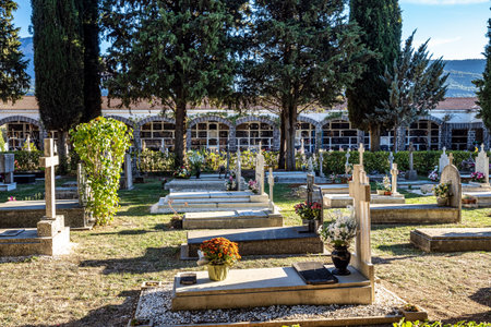 Jaca, Spain - Oct 25, 2022: Detail on the christian graveyard with marble tombs and crosses in Jaca, Spain. Cementerio Municipal de Jacaのeditorial素材