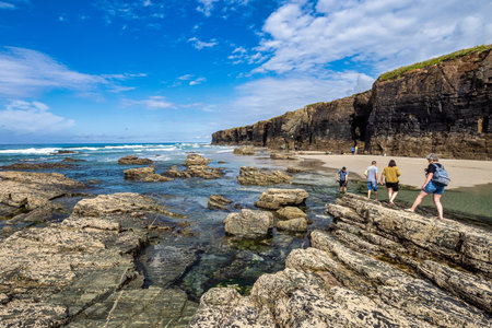 Ribadeo, Spain - Jun 22, 2023: Natural rock arches Cathedrals beach, Playa de las catedrales at Ribadeo, Galicia, Spain. Famous beach in Northern Spain Atlantic.のeditorial素材