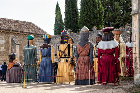 Burgos, Spain - Jun 17, 2023: Gigantes and cabezudos at Fiesta del Curpillos in Burgos, Castile and Leon, Spain. Giants and Big Heads parade is typical in festive days in Spainのeditorial素材