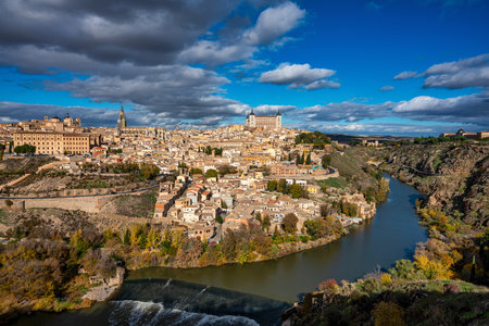 Toledo, Spain - Nov 30, 2022: Old city with its Alcazar, Royal Palace over the Tagus River sinuosity. Spain, Europeのeditorial素材