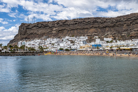 Gran Canaria, Spain - Feb 21, 2023: Seafront of Puerto de Mogan, Gran Canaria, Canary Islands, Spain. It is a most popular place with shopping facilities, restaurants and pubs.のeditorial素材