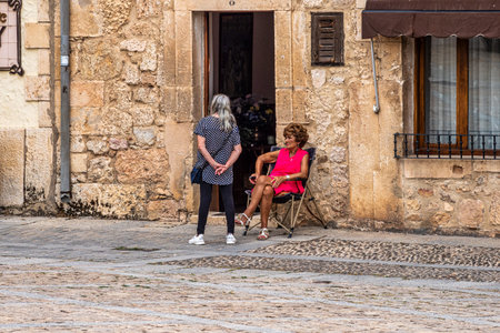 Covarrubias, Spain - Jun 16, 2023: The old town of the medieval village of Covarrubias, Burgos, Castilla y Leon, Spain. Traditional streets with traditional patterns on the buildings wallsのeditorial素材