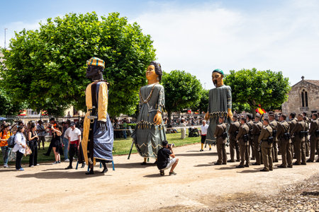 Burgos, Spain - Jun 17, 2023: Gigantes and cabezudos at Fiesta del Curpillos in Burgos, Castile and Leon, Spain. Giants and Big Heads parade is typical in festive days in Spainのeditorial素材